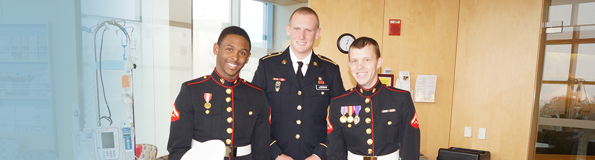 photo of three veterans in dress uniforms